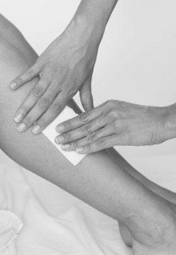 Image of leg waxing in action